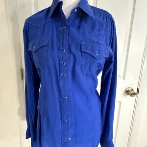 Blue Western Shirt with snap buttons.